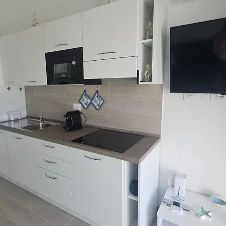 Golden Sunset House - Isola Rossa Апартаменты *